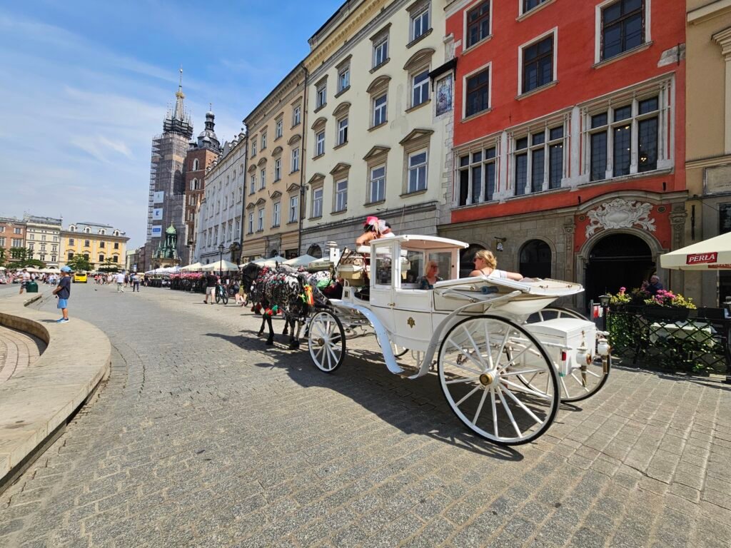A horse-drawn carriage waiting to take visitors through Kraków's Old Town