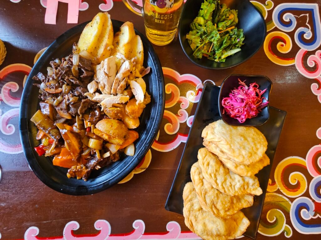 Mongolian meal with khuushuur and tsuivan