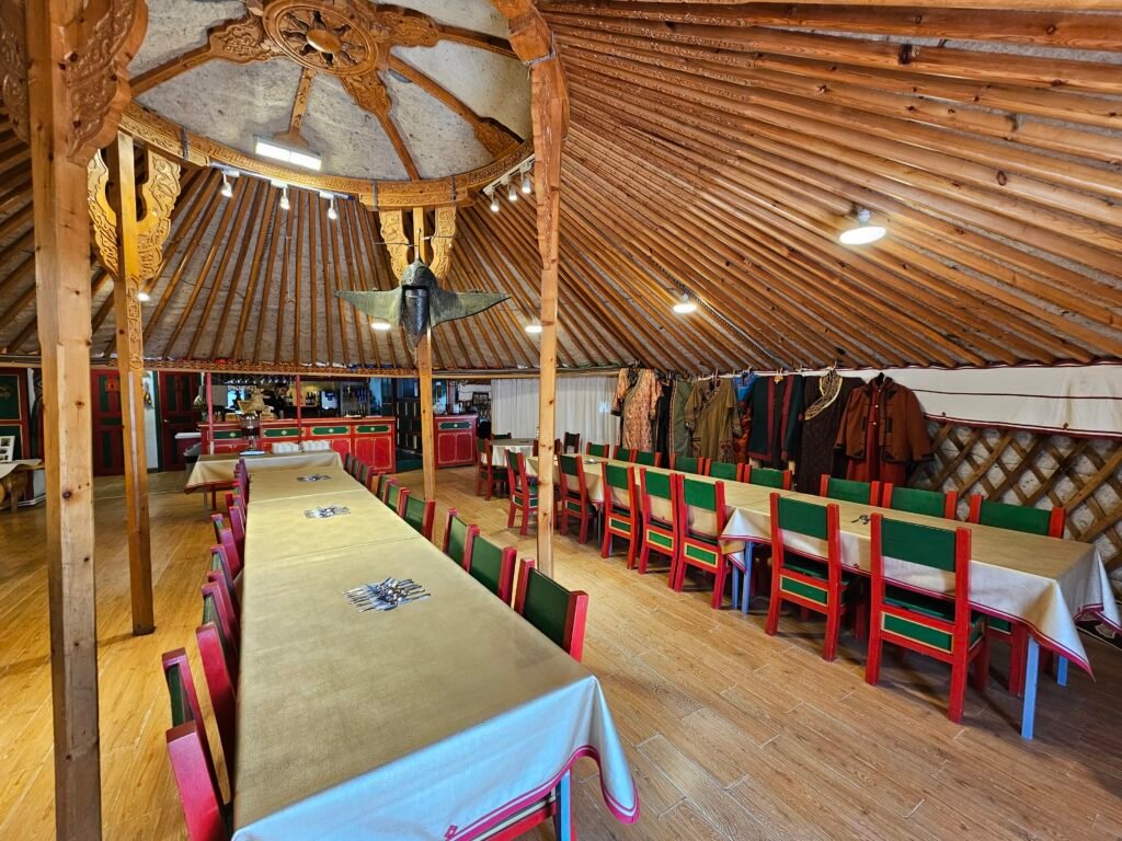 Nomadic family demonstrating daily life at Mongol Nomadic Tourist Camp