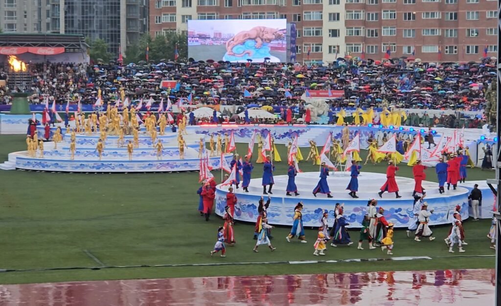 Family watching the Naadam Festival opening ceremony