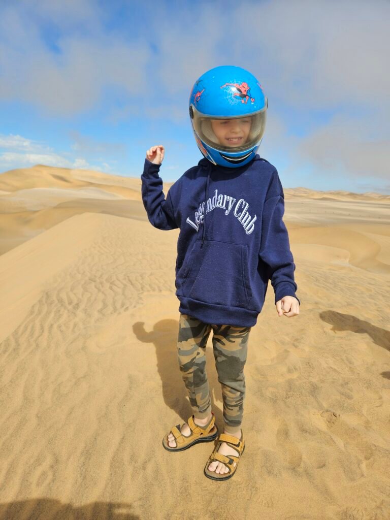 Family quad biking tour through the Namib Desert dunes near Swakopmund