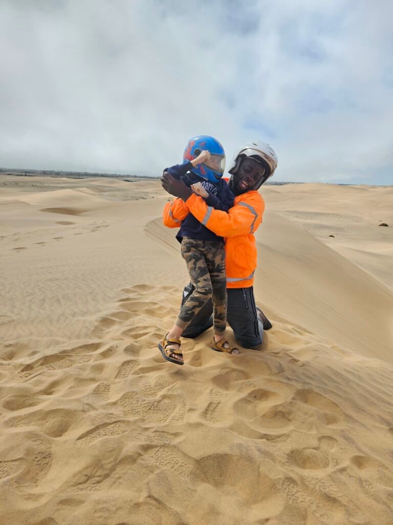 Child enjoying a desert quad biking adventure near Swakopmund