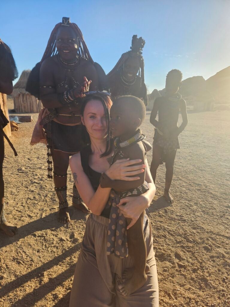 Family discussing traditional Himba life as part of worldschooling