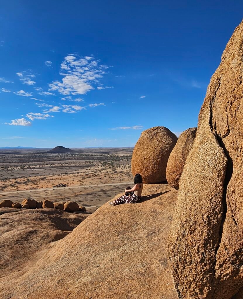 Family hiking and rock scrambling at Bushmen Paradise, Namibia