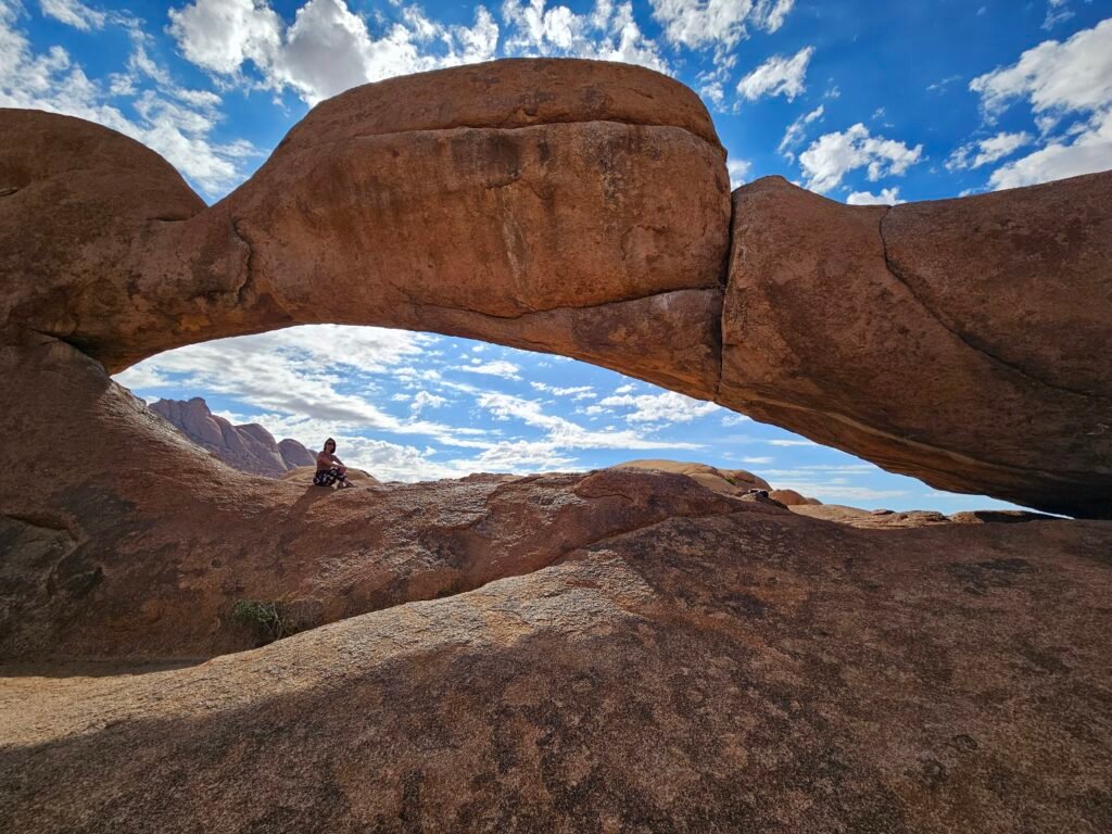 Hiking among the boulders of Spitzkoppe, Namibia