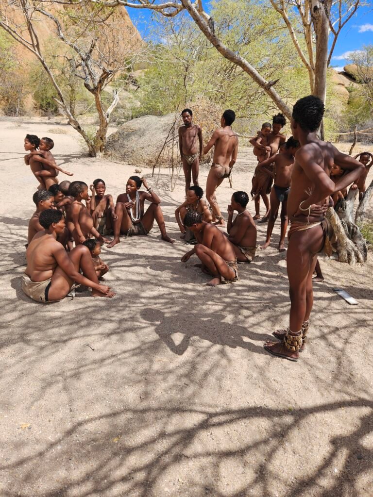 San community member demonstrating traditional survival skills in Namibia