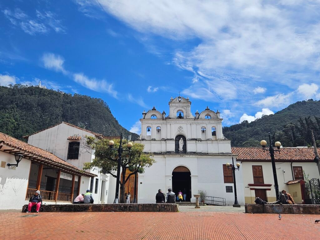 White colonial church on Chorro de Quevedo square in La Candelaria, Bogotá