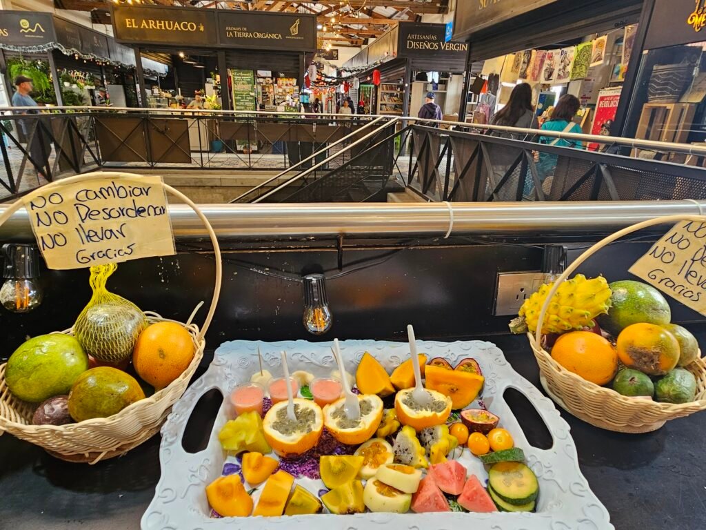 Tropical fruit tasting platter at a Bogotá food market