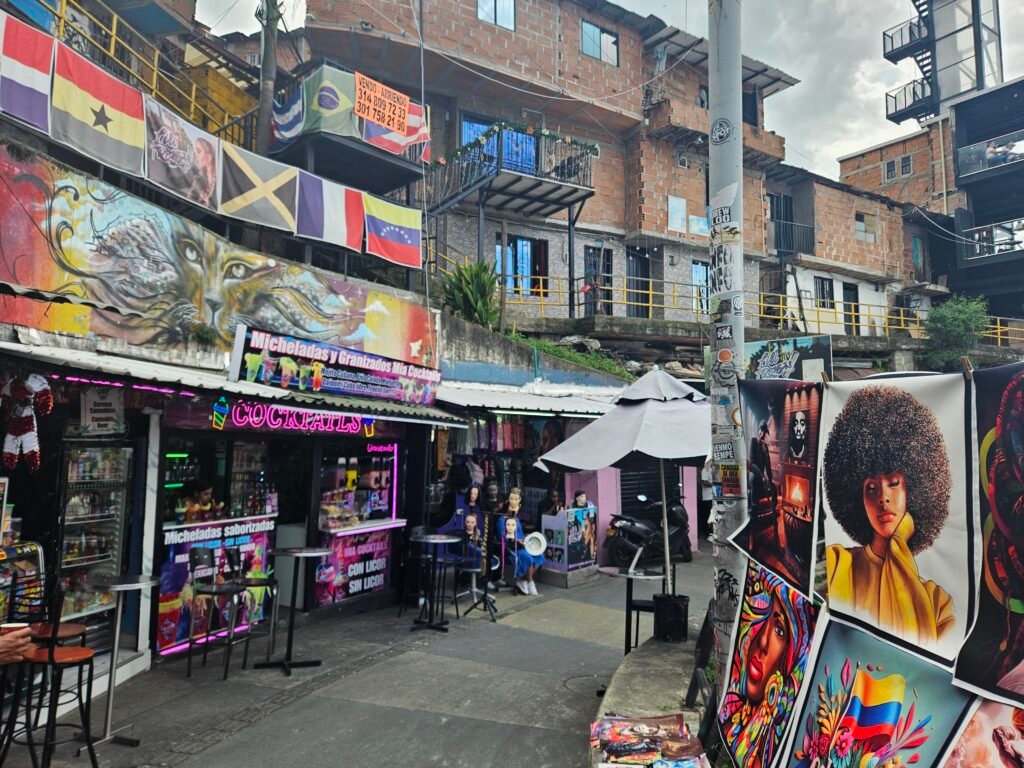Colourful street stalls and murals in Comuna 13, Medellín