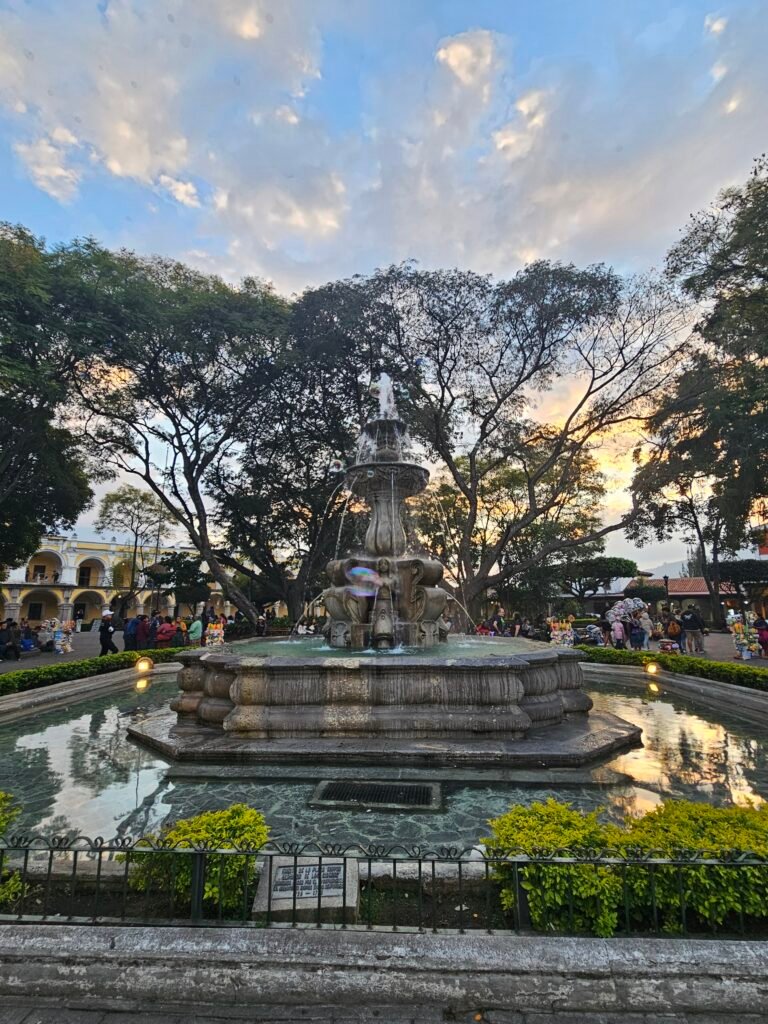 Families relaxing in Parque Central, Antigua Guatemala