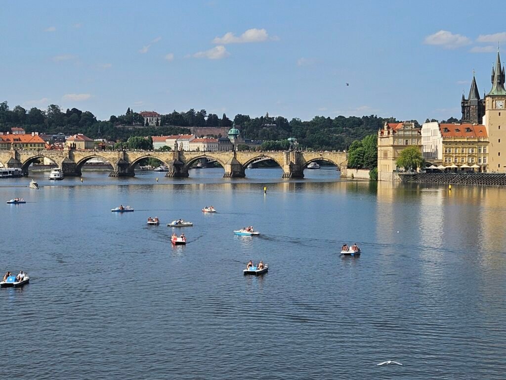 Charles Bridge and the Old Town Bridge Tower seen from the Vltava River in Prague