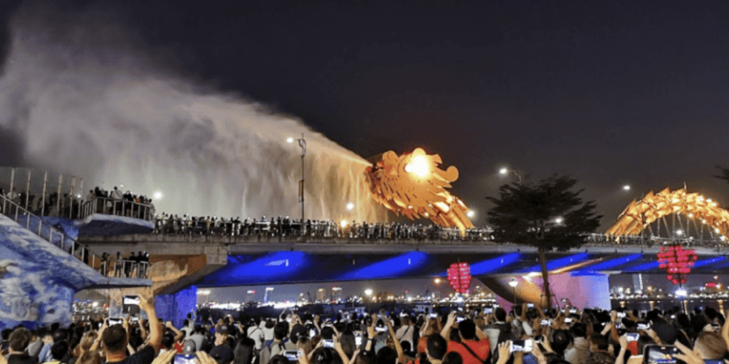 See the Dragon Bridge breathe fire in Da Nang with kids