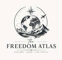 The Freedom Atlas logo - vintage globe, mountain, and compass illustration with tagline Explore. Learn. Live Freely.
