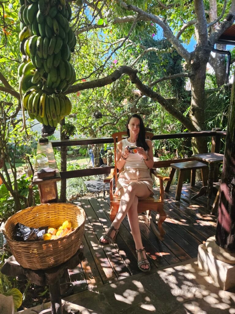 Woman relaxing on a terrace under banana plants in El Salvador