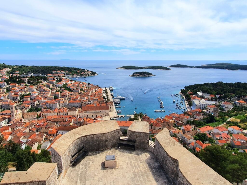 View over Hvar town's red rooftops and harbour from the hilltop fortress