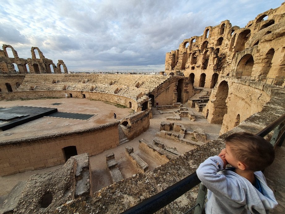 Our son looking out over the Roman amphitheatre of El Jem in Tunisia