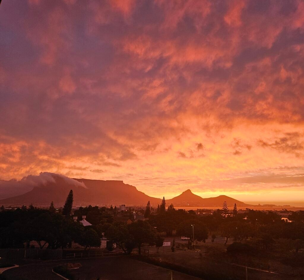 Orange sunset sky over the mountains