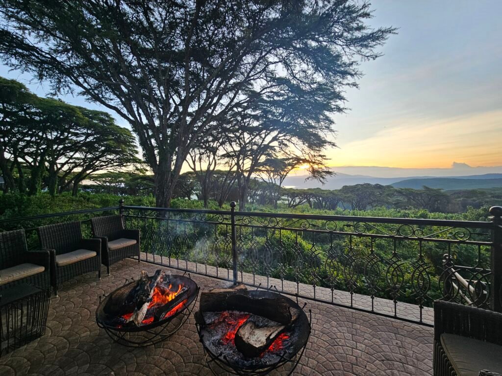 Fire pits on the terrace of our safari lodge in Tanzania at sunset