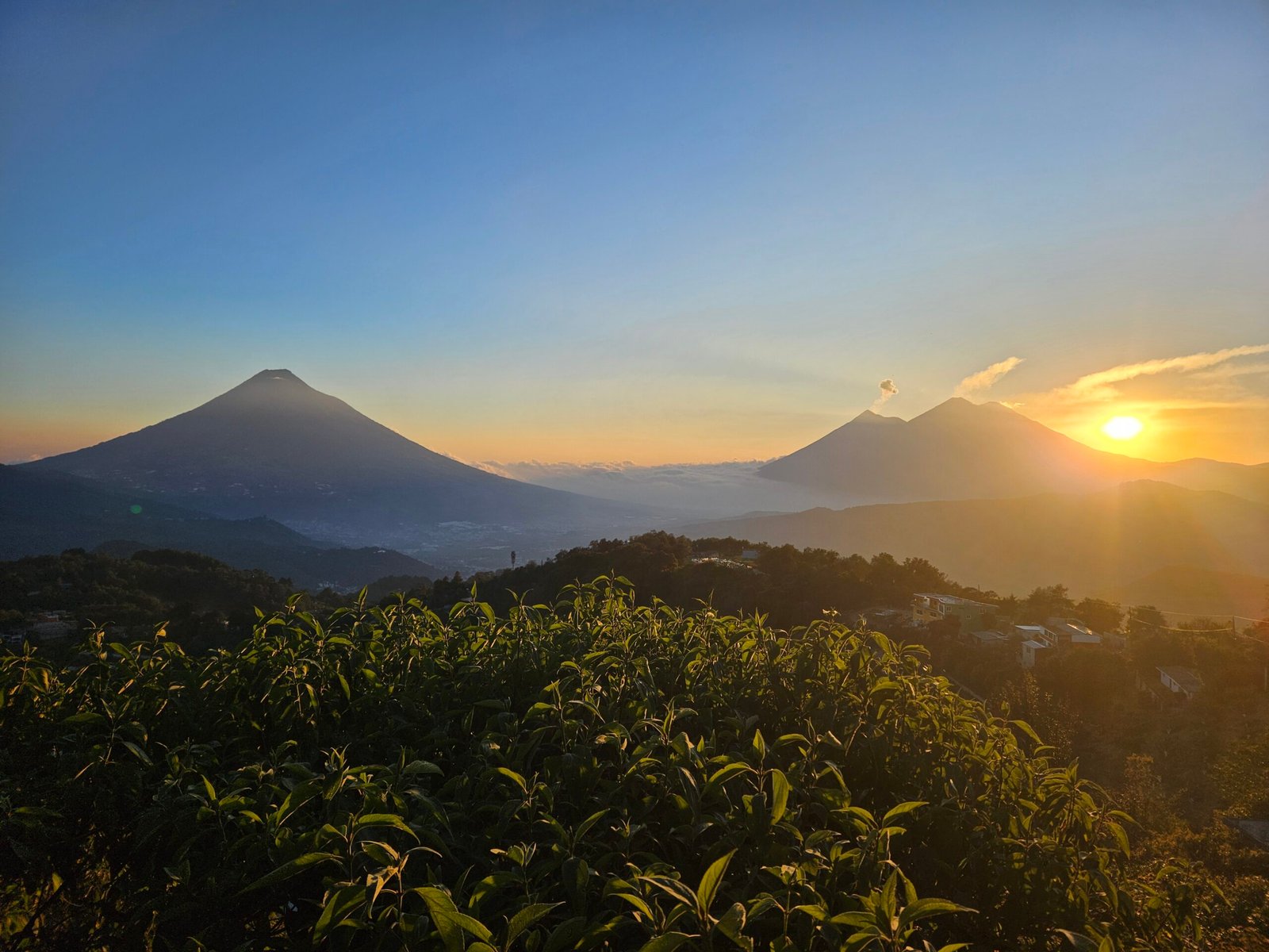 Sunset over the volcanoes from the hills above Antigua, Guatemala